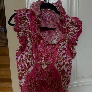 Love the label.  Tatiana sleeveless.  Ruffle top.    Worn 2 times